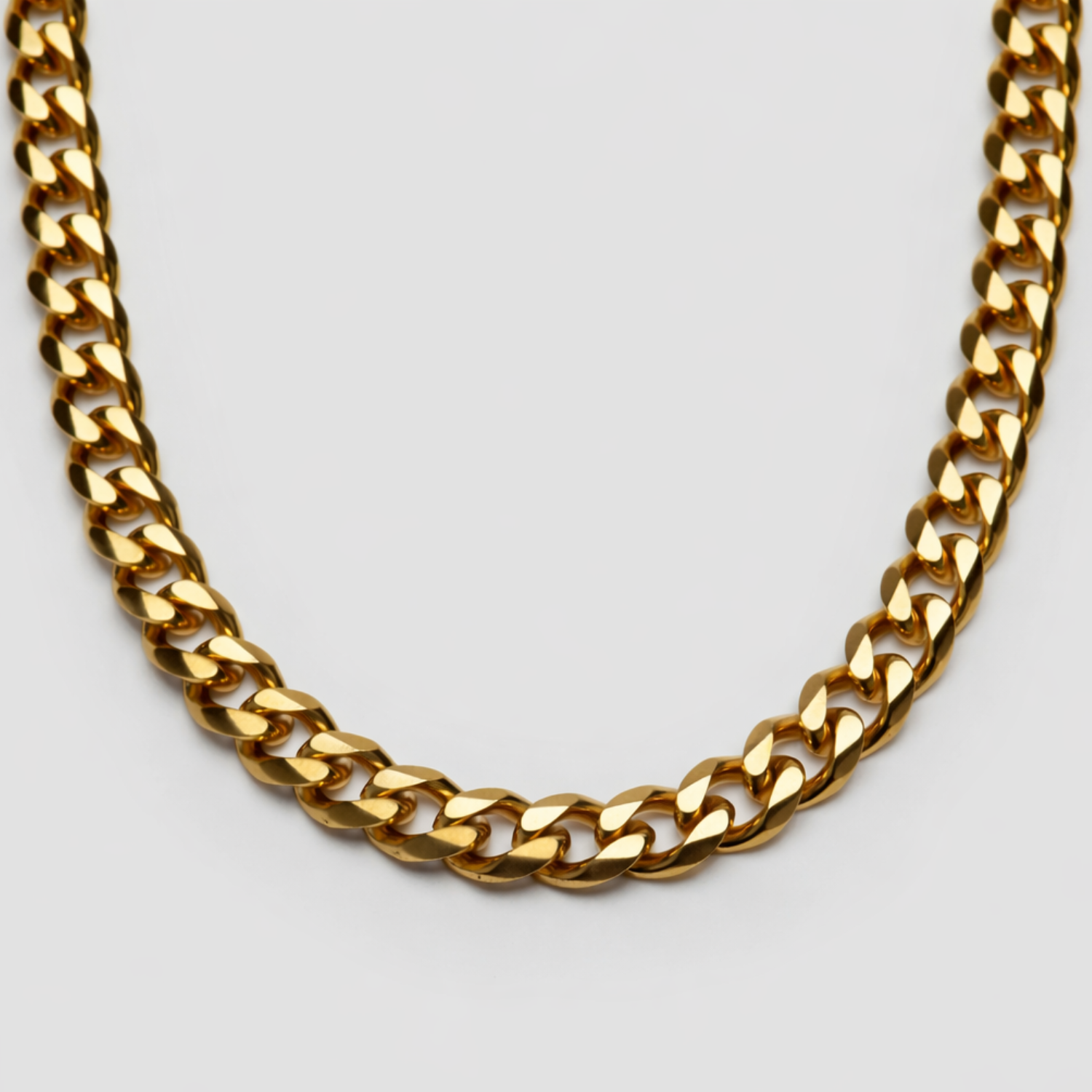 18k gold Cuban link necklace 8mm by GRISÉ NYC featuring a polished finish and bold structure. Tarnish resistant, durable, and designed for everyday wear.