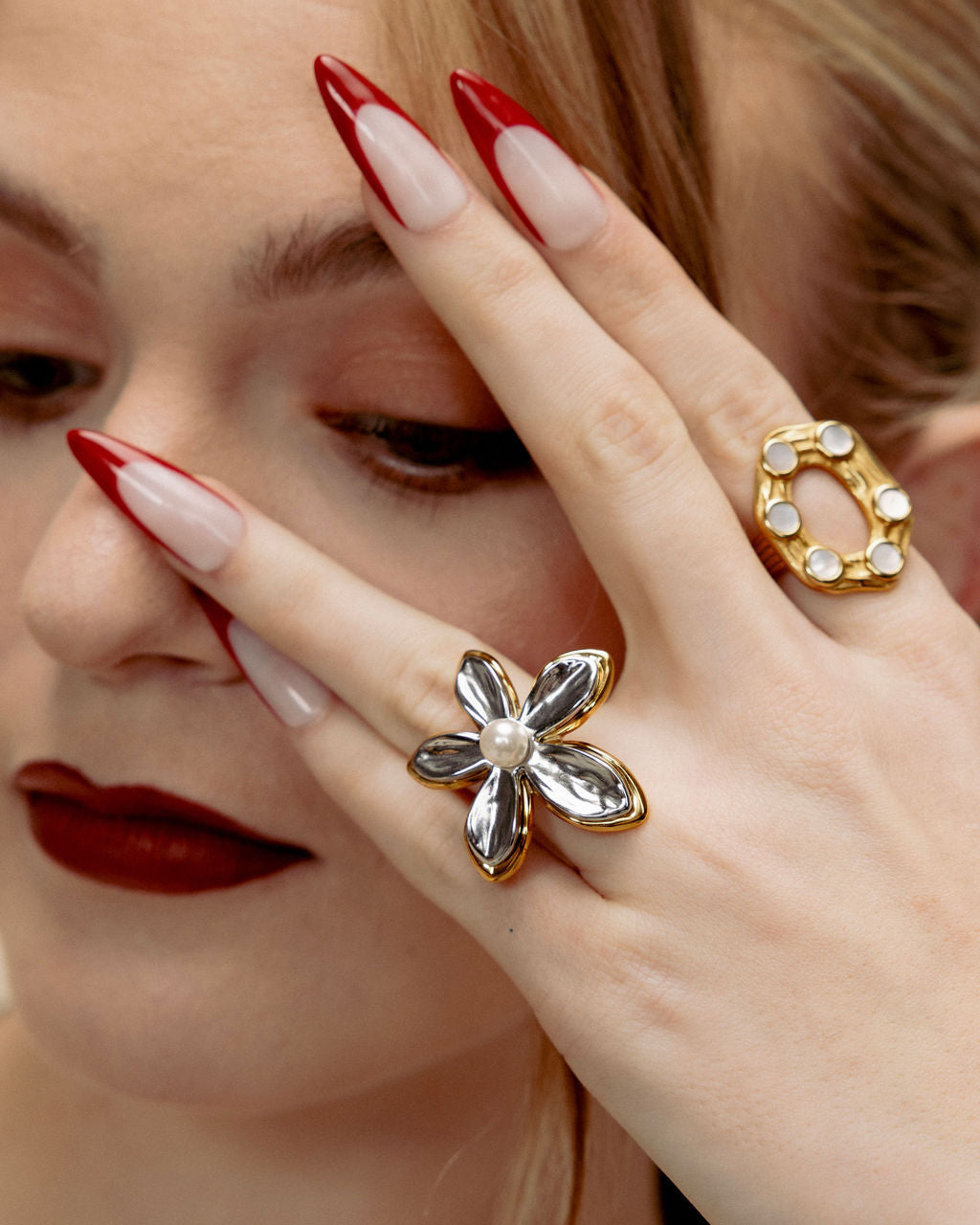 Model wearing GRISÉ NYC flower pearl ring.
