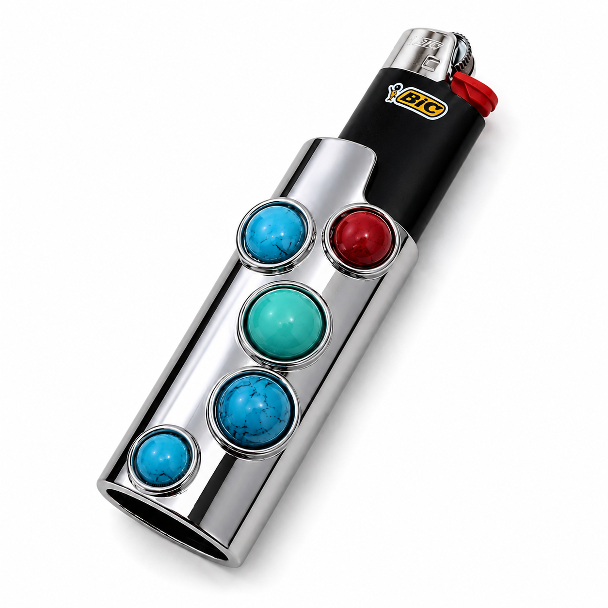 Black BIC J6 Maxi lighter with GRISÉ NYC silver-tone gemstone lighter case featuring turquoise and red stones in a polished metal setting.
