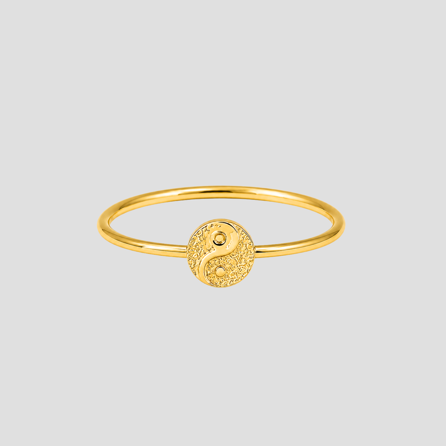 GRISÉ NYC Dainty Ying Yang 18k Gold Ring in 18k gold plated stainless steel featuring a textured yin yang symbol on a slim minimalist band.