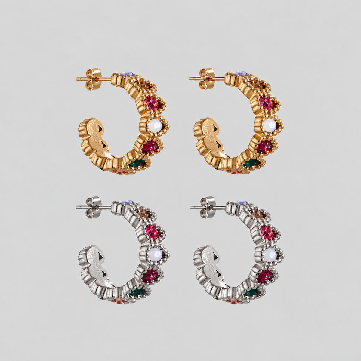 GRISÉ NYC Gemma Multicolor Hoop Earrings in gold and silver, featuring textured sculptural hoops adorned with vibrant multicolored cubic zirconia stones and butterfly back closures.