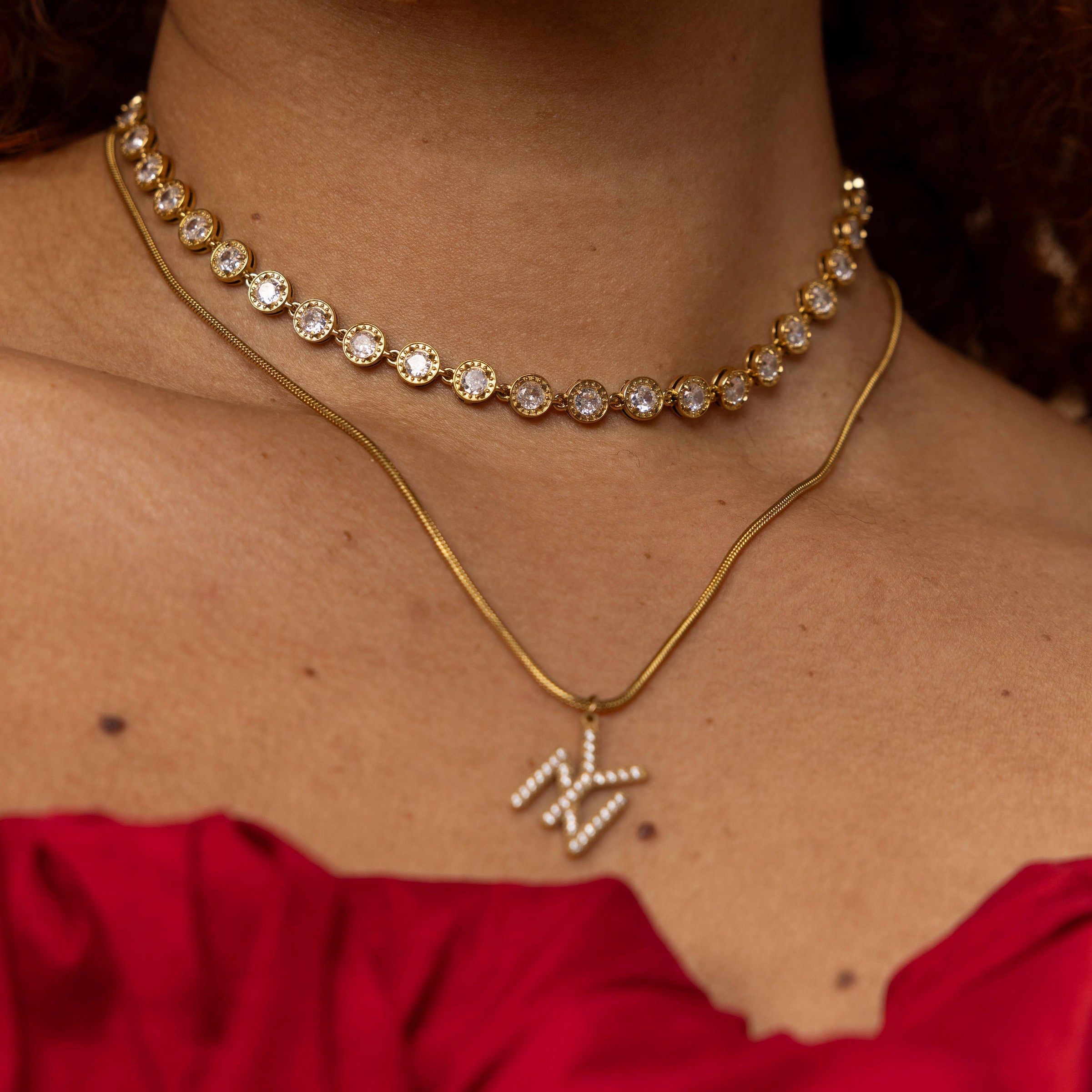 GRISÉ NYC gold gemstone necklace on model dainty layered look close up