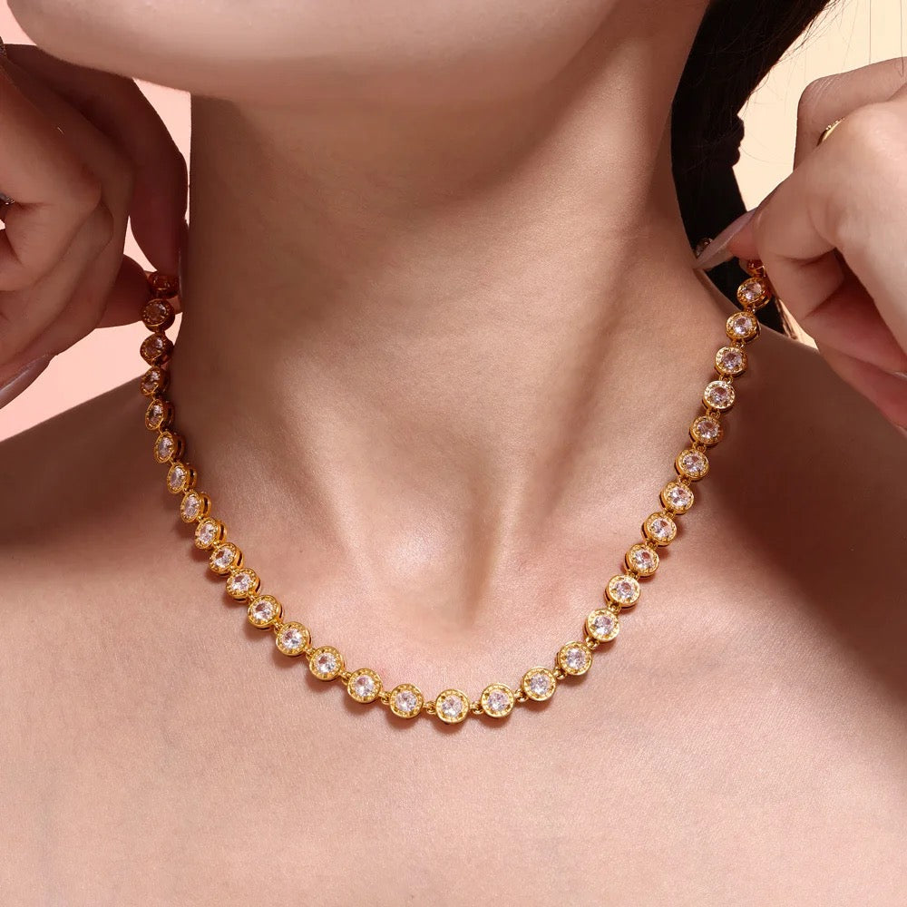 GRISÉ NYC gold gemstone necklace on model side profile luxury jewelry look