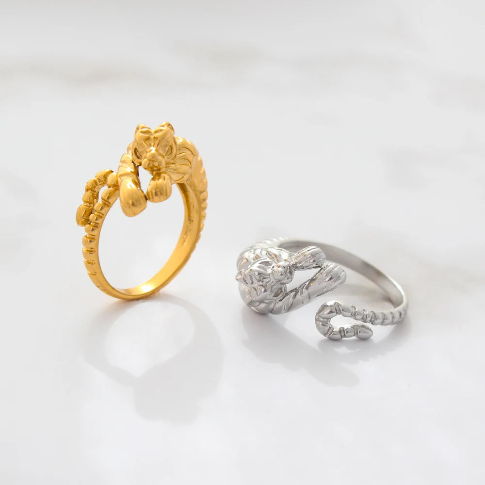 Tiger statement rings by GRISÉ NYC shown in gold and silver stainless steel colorways unisex adjustable bold jewelry.