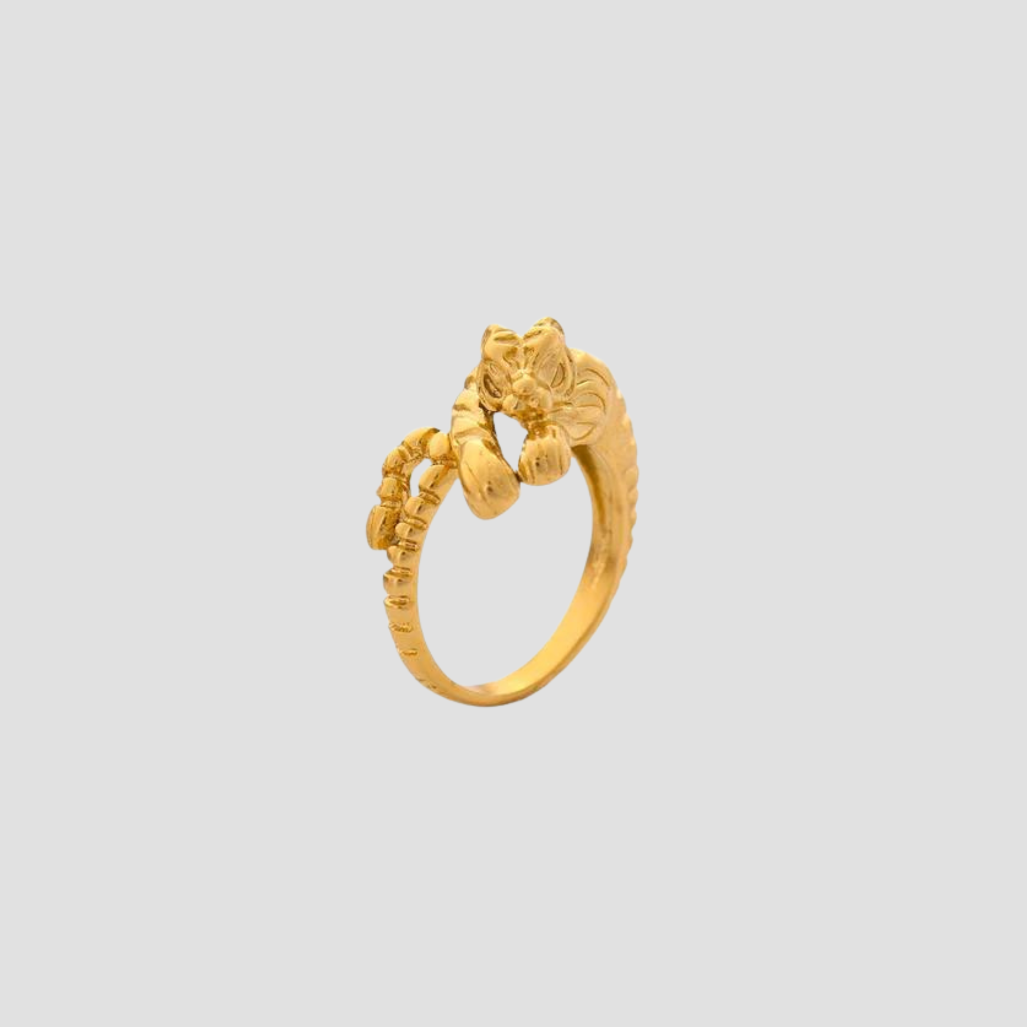 Unleash bold style with the GRISÉ Golden Tiger ring. 18k gold plated stainless steel statement ring that is tarnish free durable and unisex.