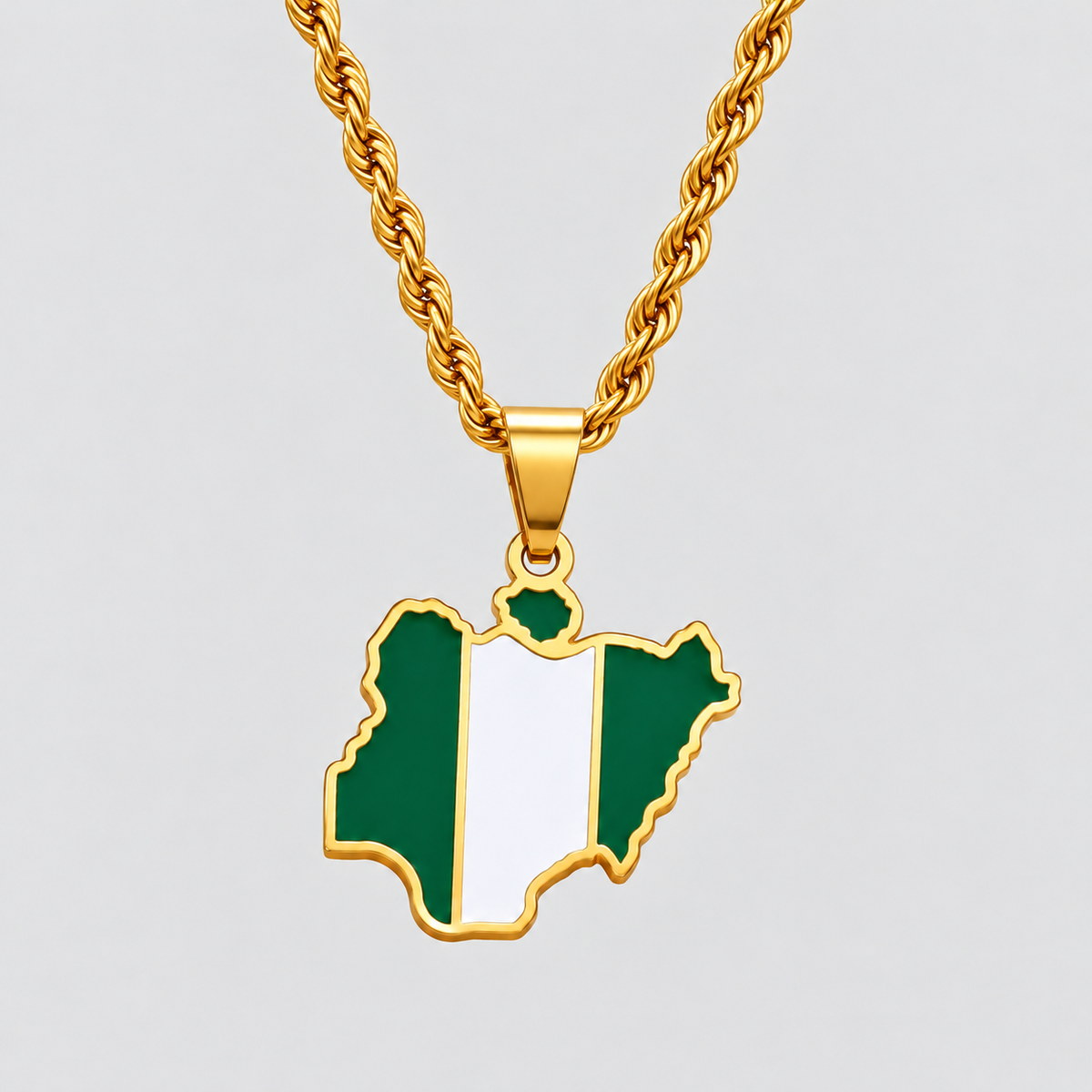 GRISÉ NYC gold Nigeria flag map pendant necklace featuring green and white enamel detailing on a 3mm gold rope chain.