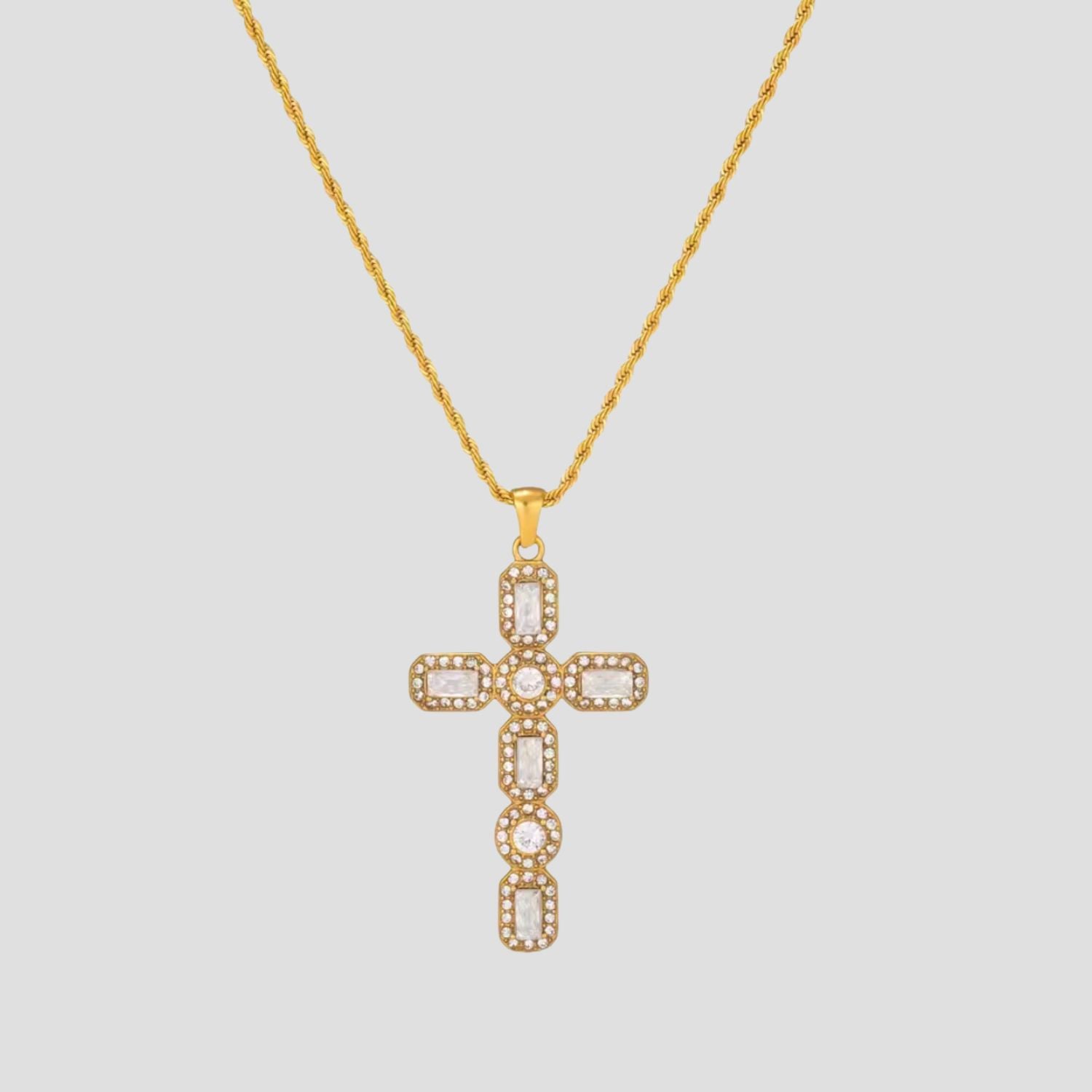 GRISÉ NYC Renaissance Cross Necklace featuring white gemstones set in a gold-tone stainless steel cross pendant.