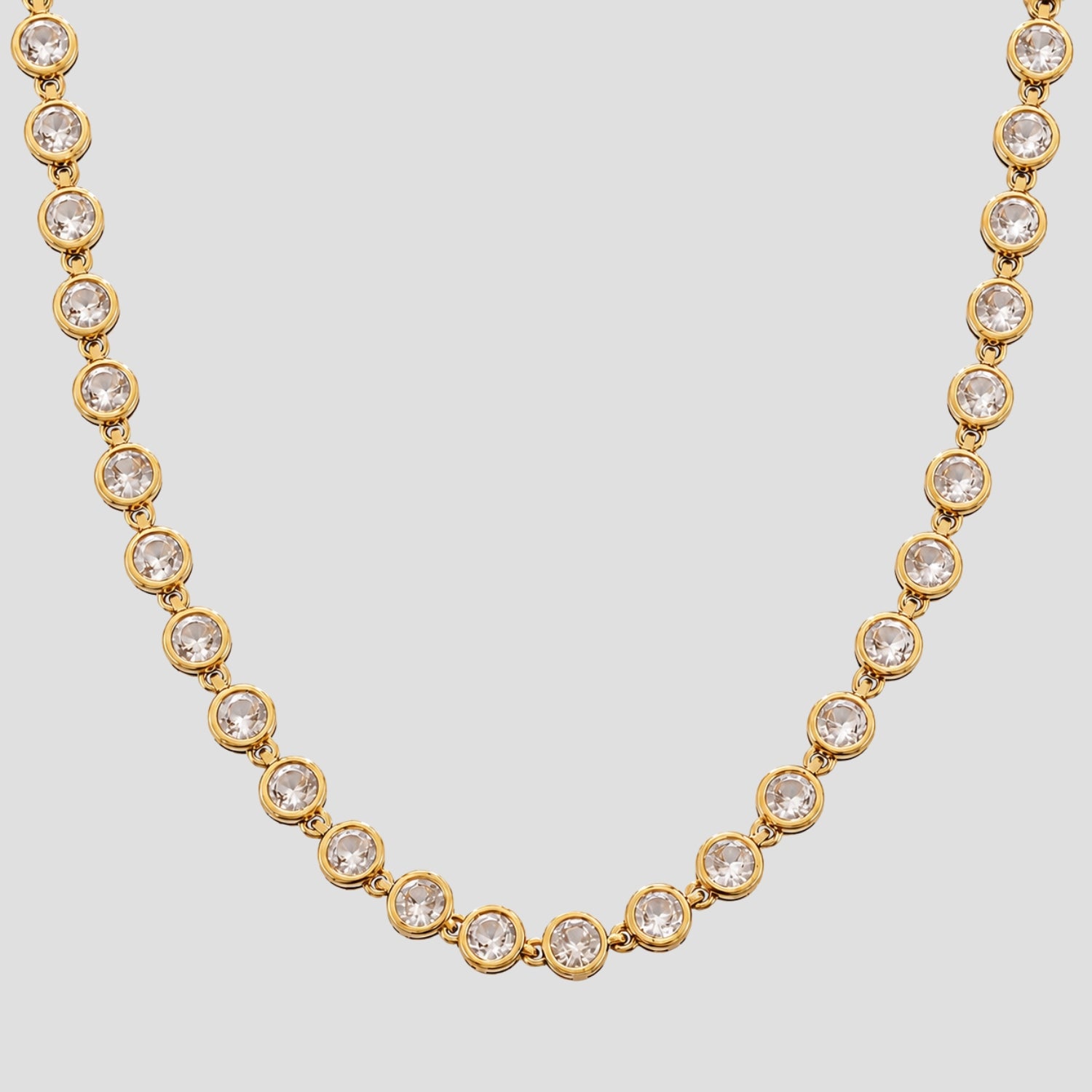 GRISÉ NYC Royal Bezel Gemstone Necklace 2.0 in 18K gold plated stainless steel with bezel-set clear cubic zirconia stones.