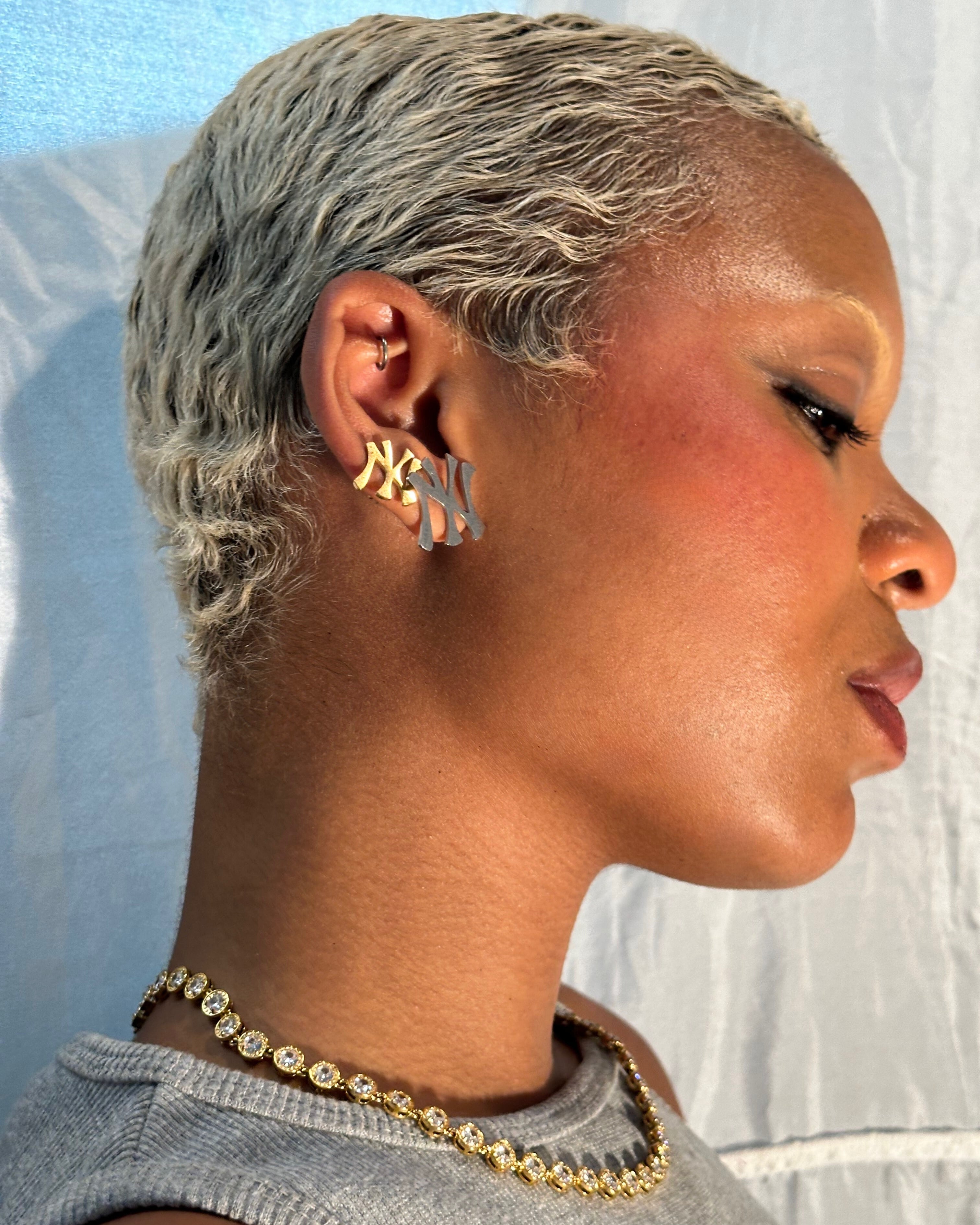GRISÉ NYC royal gold gemstone necklace styled layered gold jewelry look