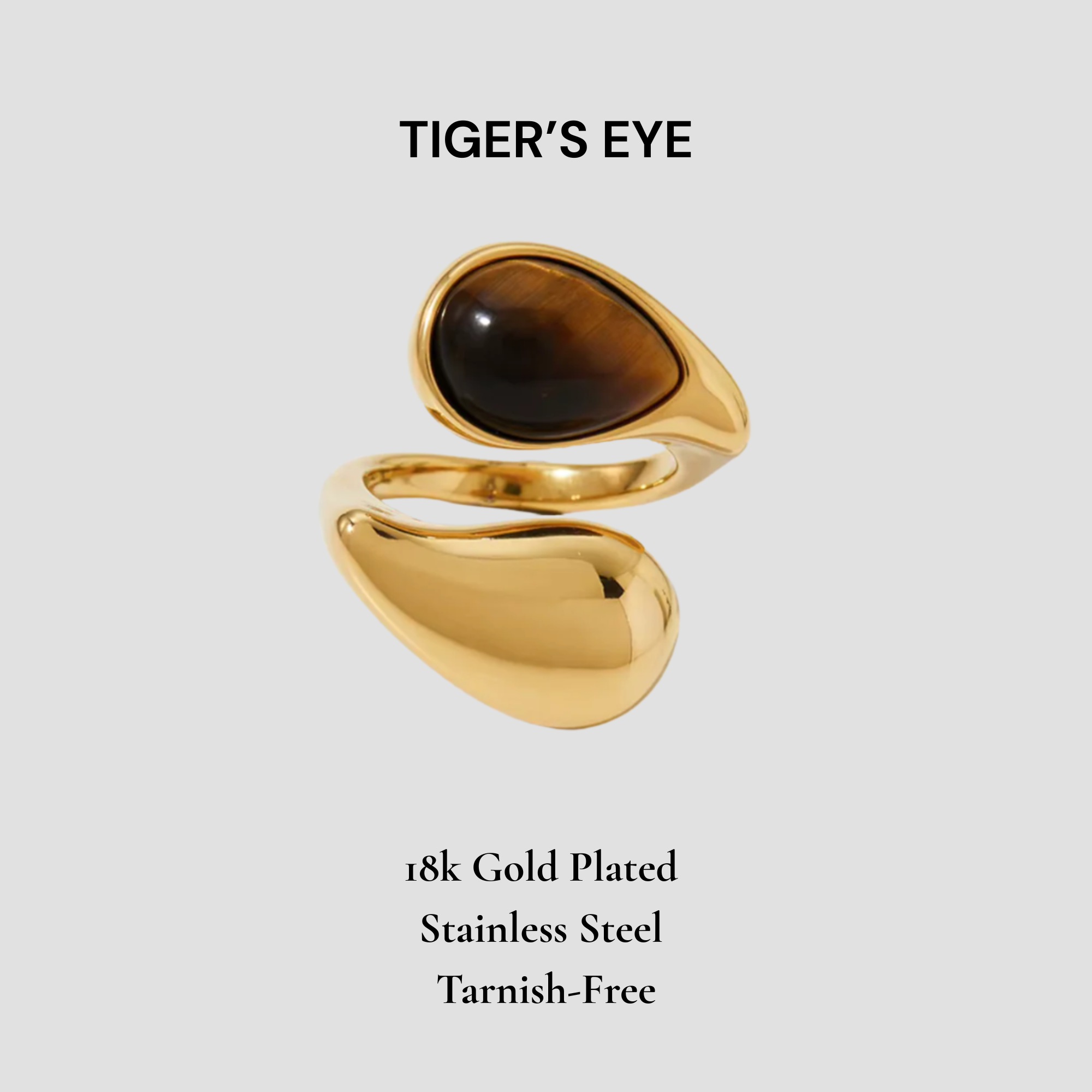 GRISÉ NYC Tiger’s Eye Eclipse Ring in 18k gold plated stainless steel featuring a sculptural open band and polished tiger’s eye stone.