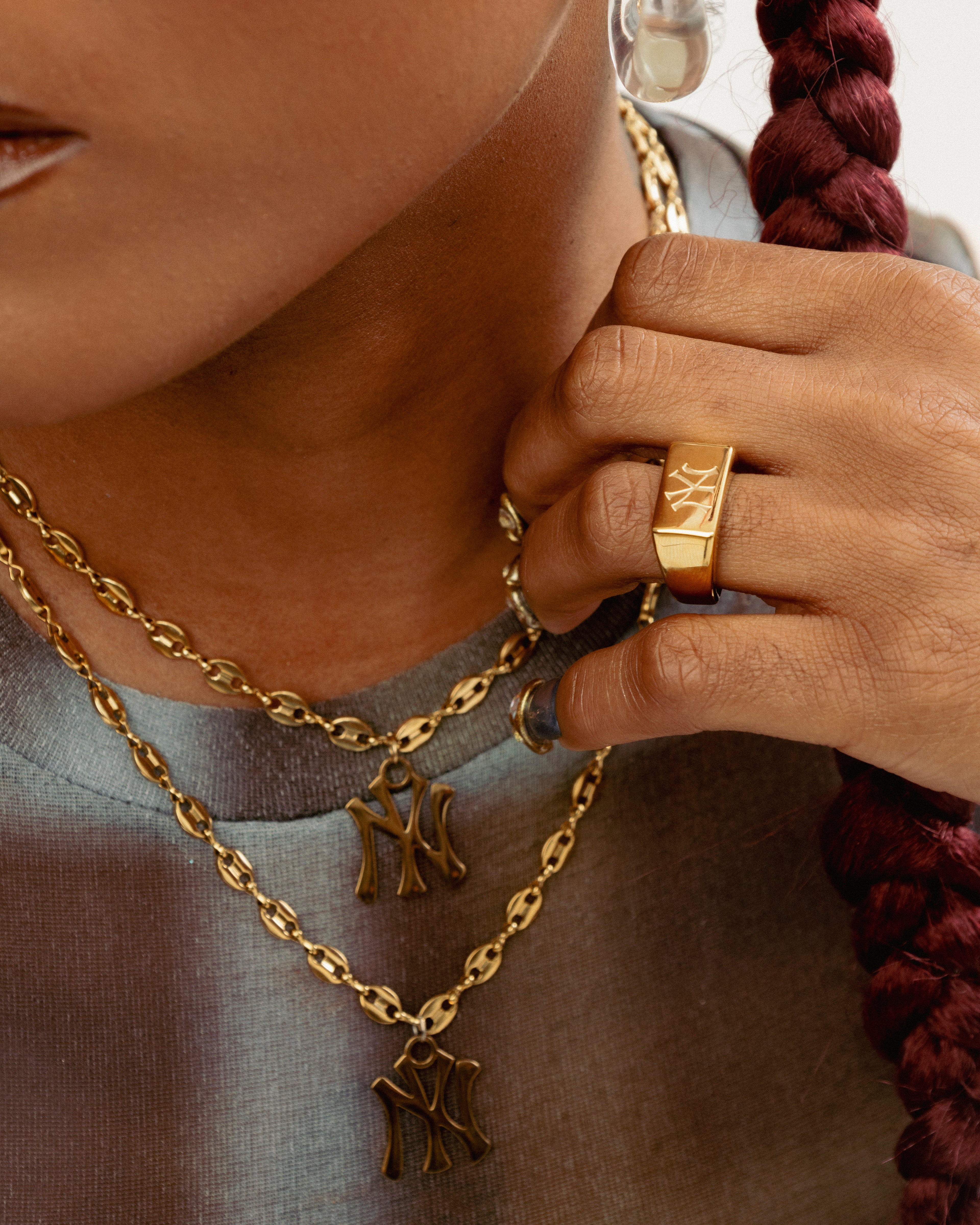 GRISÉ NYC Yankees logo ring and mariner Yankees logo necklace in 18k gold plated stainless steel.