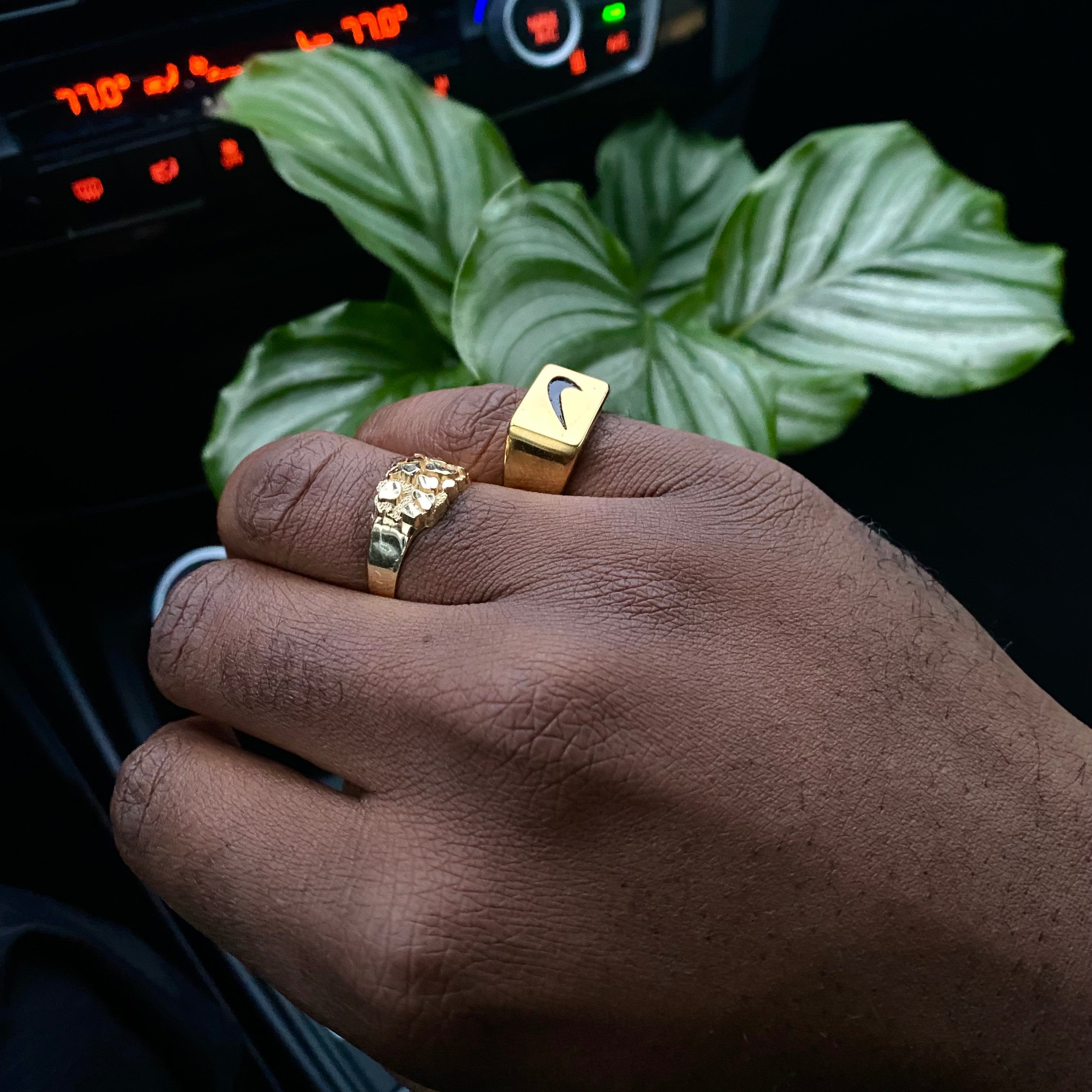 Close up of Just Do It 18k gold plated stainless steel signet ring by GRISÉ NYC