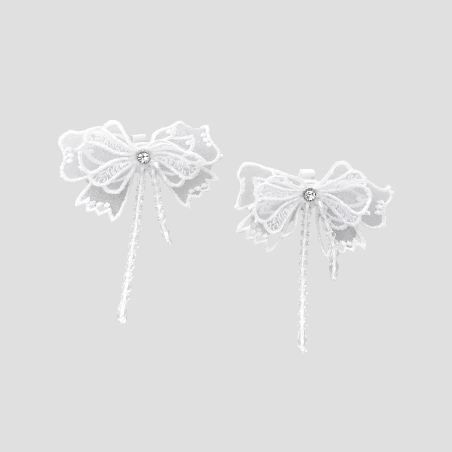 Luxury white bow sneaker accessories with crystal details GRISÉ NYC.