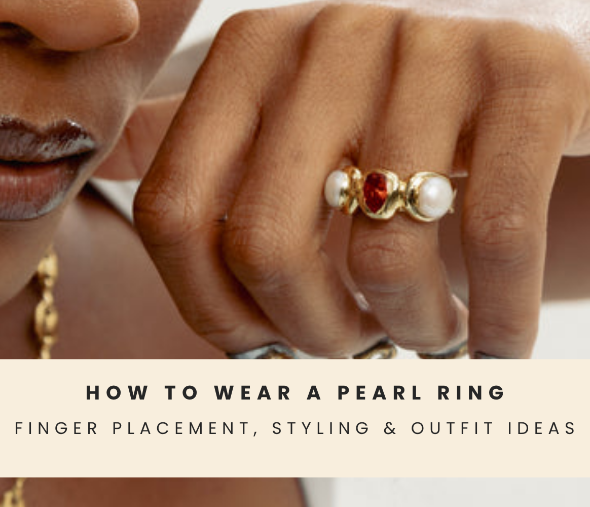Hand wearing a pearl ring as an everyday jewelry piece