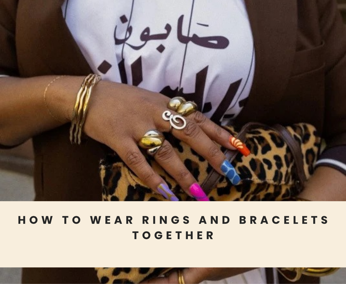 Rings and a bracelet styled together in a balanced jewelry look