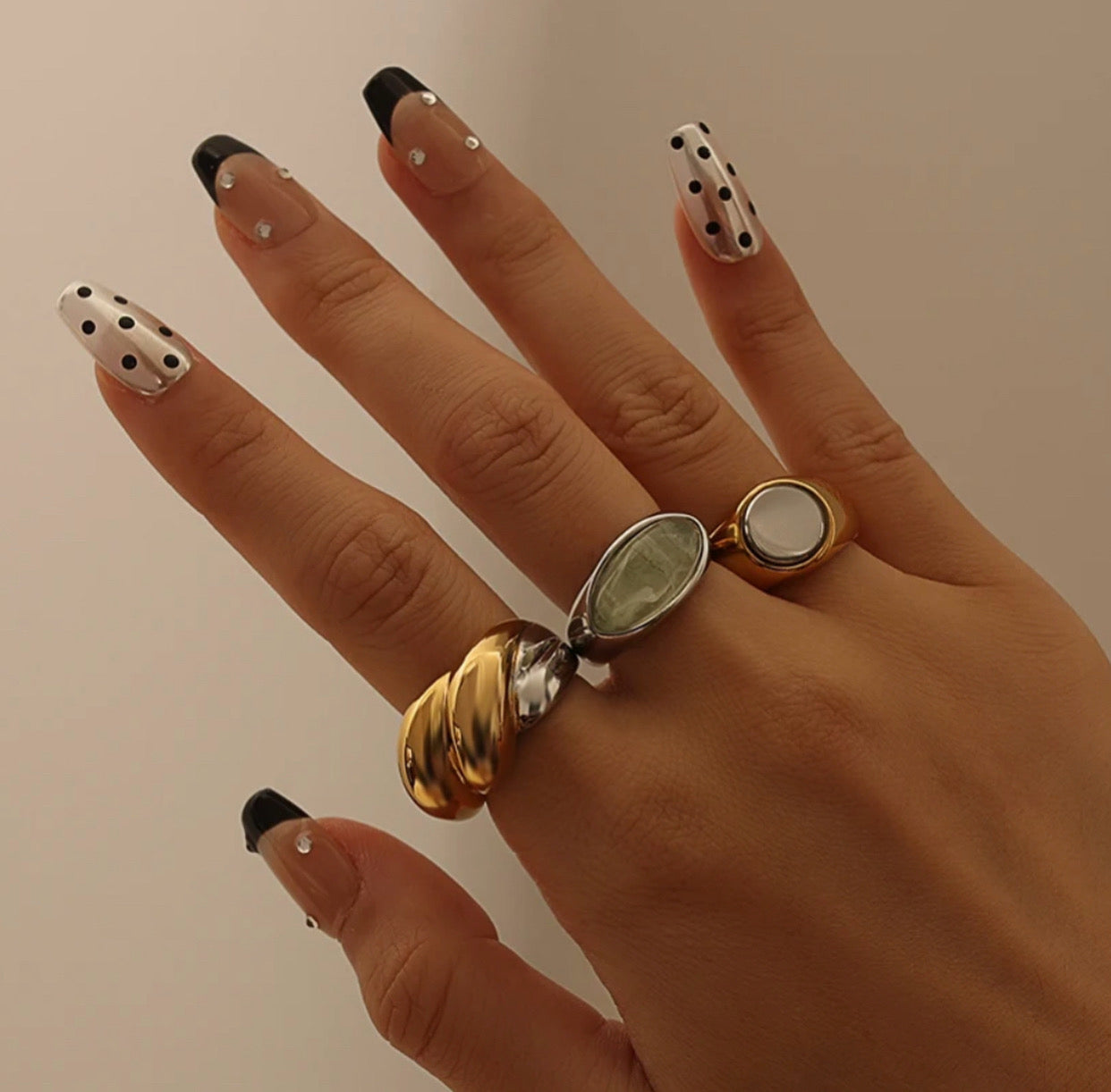 2-Tone Circle Ring by GRISÉ NYC styled in a mixed ring stack for an elevated modern statement look