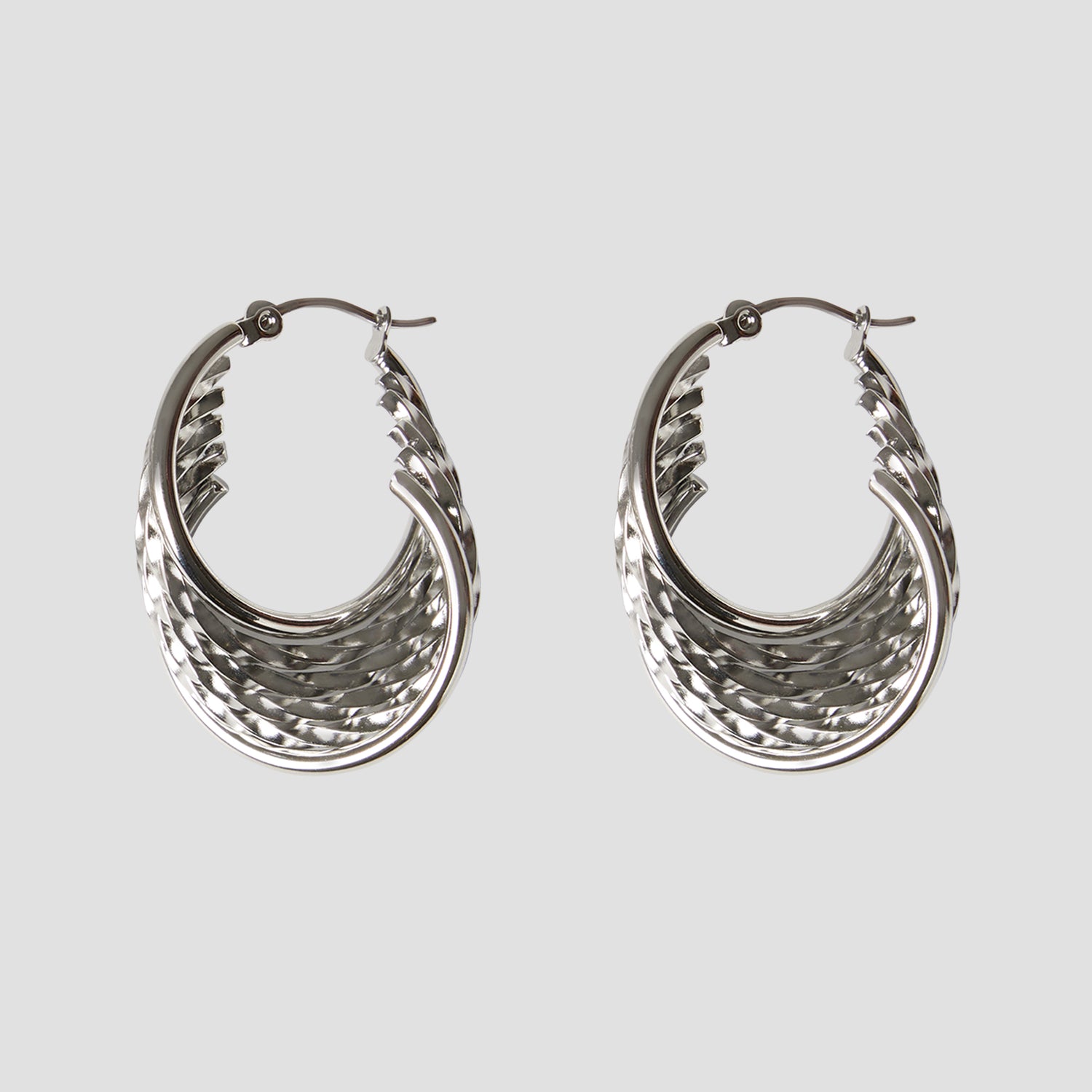 Irregular Twist Steel Oval Earrings