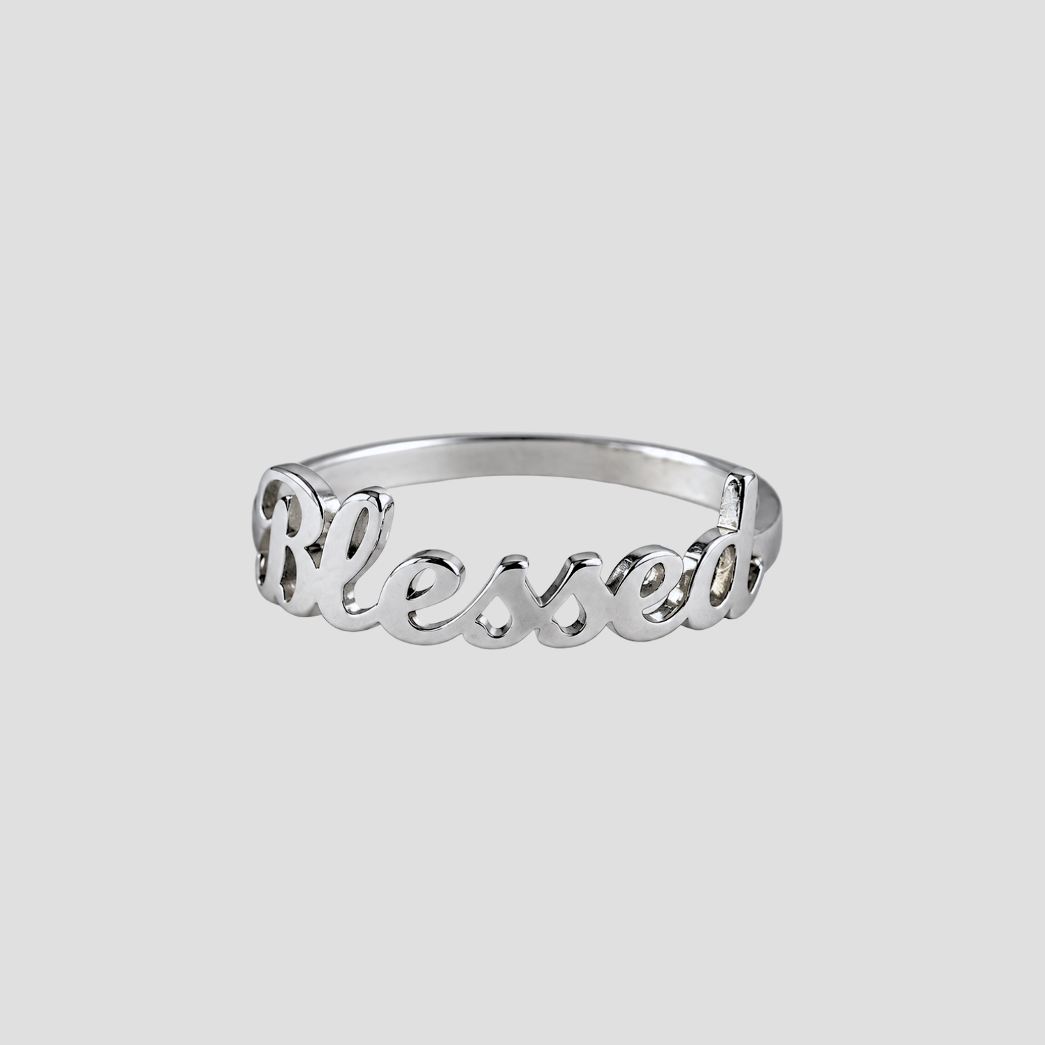 Blessed Ring in polished stainless steel featuring an open script "Blessed" design by GRISÉ NYC.