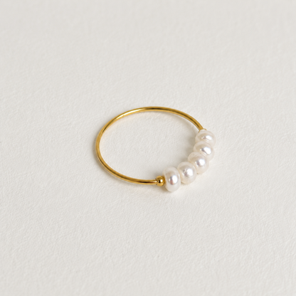 Dainty Freshwater Pearl Ring in 18k gold plated stainless steel with genuine freshwater pearls displayed on a clean white background by GRISÉ NYC.