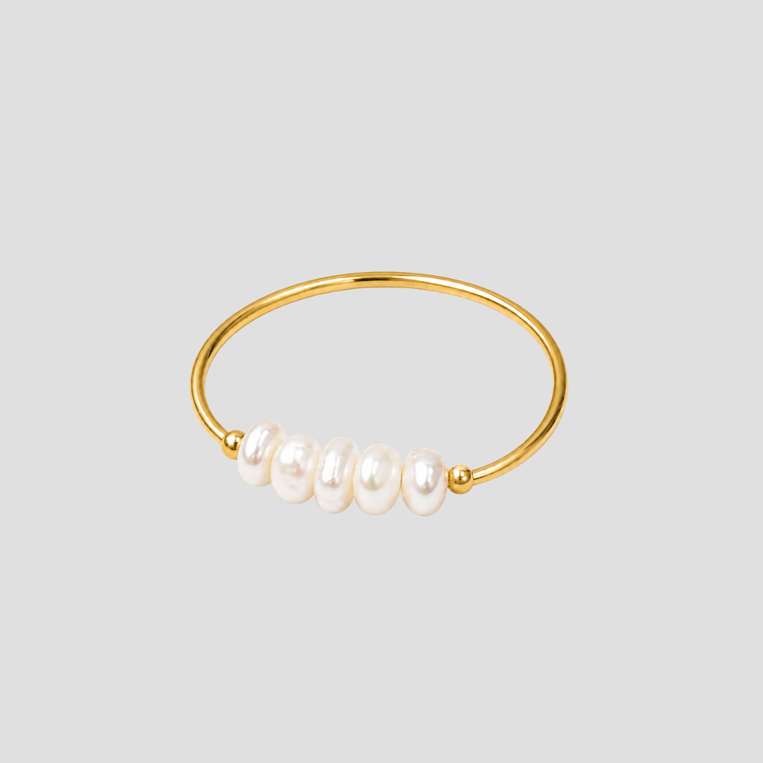 Dainty Freshwater Pearl Ring in 18k gold plated stainless steel featuring genuine freshwater pearls on a minimalist gold band by GRISÉ NYC.