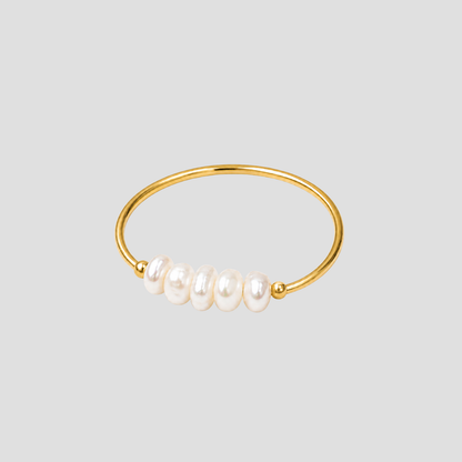 Dainty Freshwater Pearl Ring in 18k gold plated stainless steel featuring genuine freshwater pearls on a minimalist gold band by GRISÉ NYC.