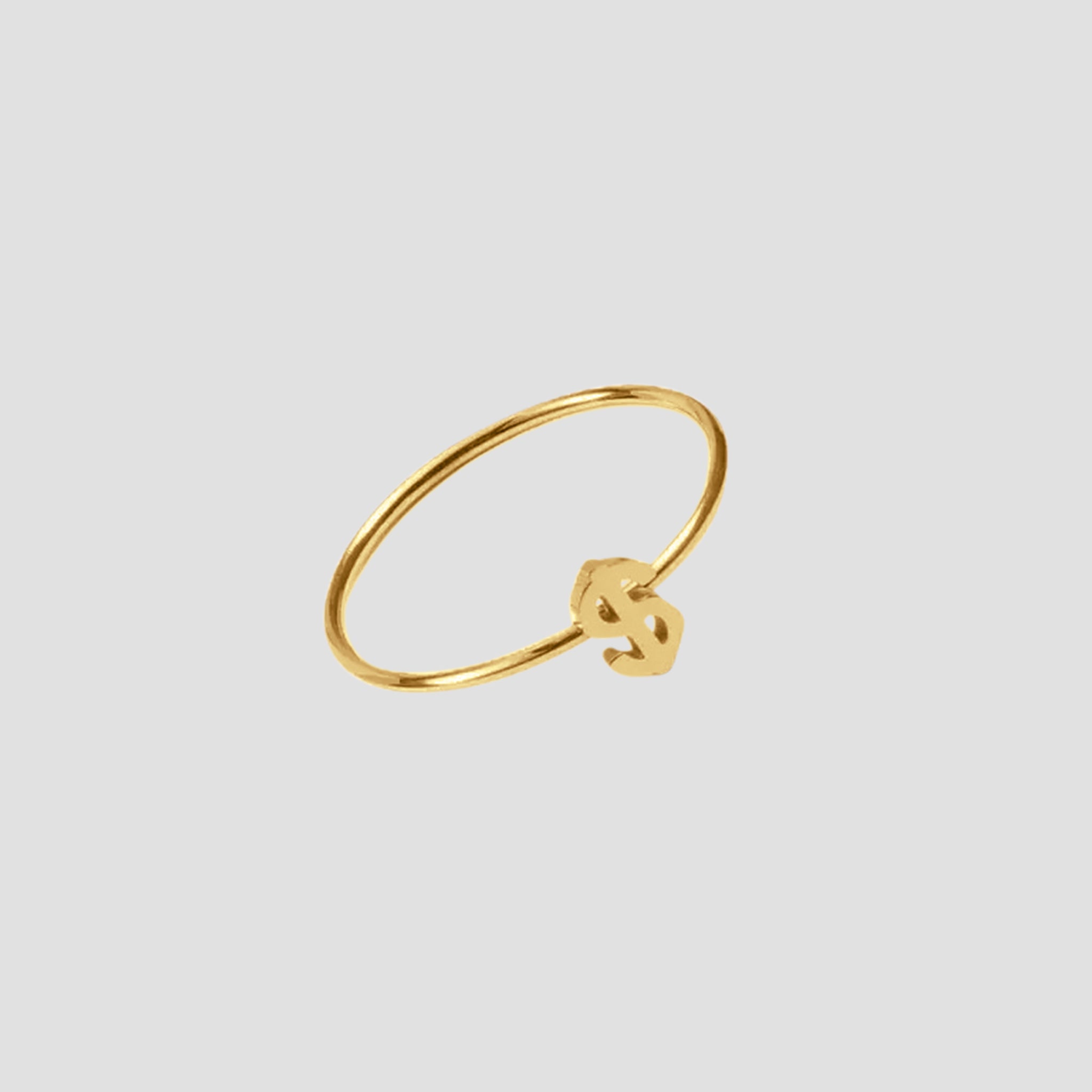 Side profile of Dainty Money Dollar Ring by GRISÉ NYC highlighting its sleek 18k gold plated minimalist band