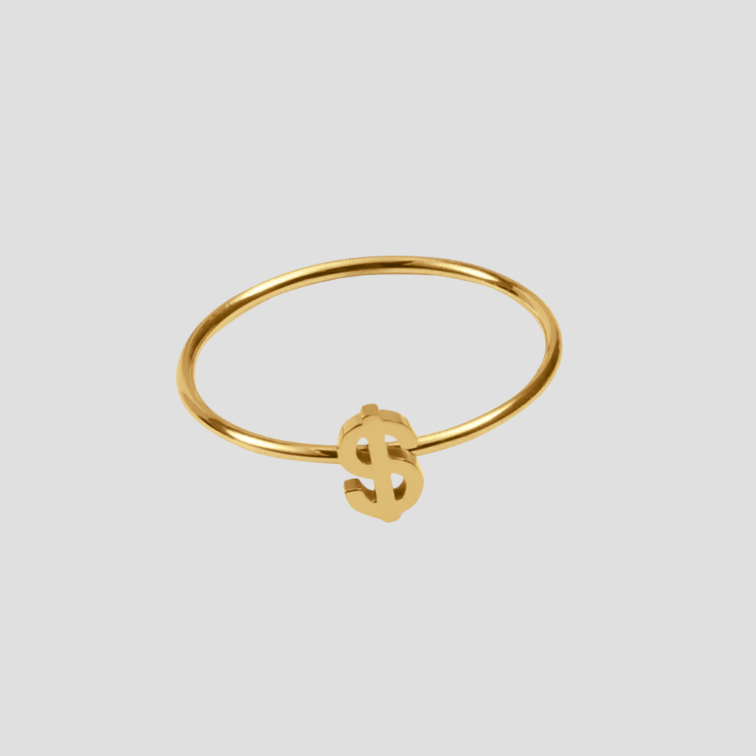 Dollar Sign Ring in 18k gold plated stainless steel featuring a minimalist dollar symbol design by GRISÉ NYC.