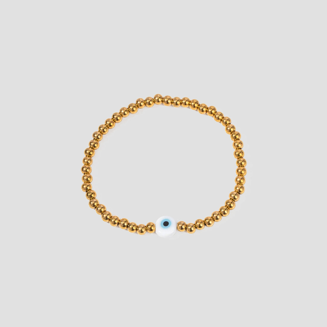 GRISÉ NYC Evil Eye Bead Bracelet in 18k gold plated stainless steel with blue protective evil eye charm.