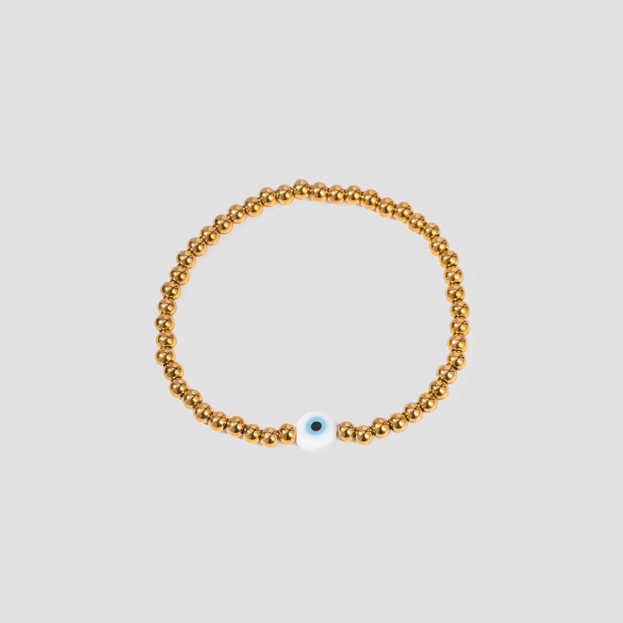 GRISÉ NYC Evil Eye Bead Bracelet in 18k gold plated stainless steel with blue protective evil eye charm.