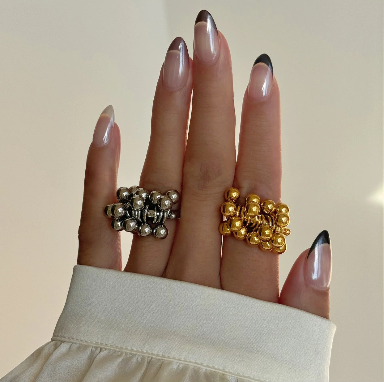 Model wearing Fiesta Cluster Rings stainless steel GRISÉ NYC