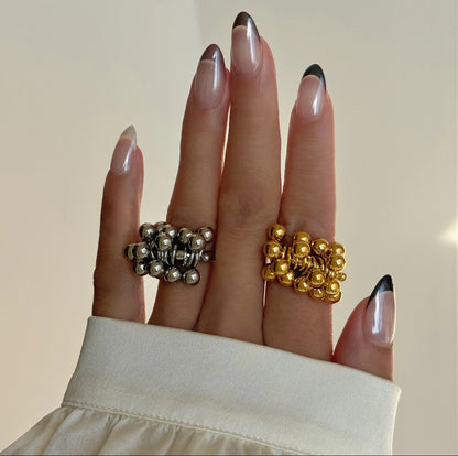 Model wearing Fiesta Cluster Rings stainless steel GRISÉ NYC