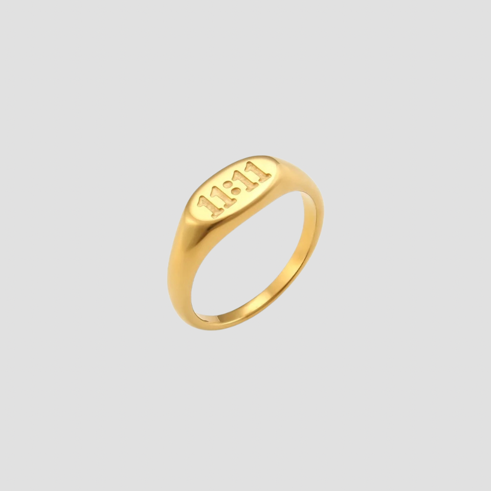 1111 Angel Number 18k Gold Ring by GRISÉ NYC — polished gold signet ring with engraved numbers.