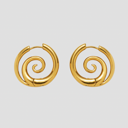 GRISÉ NYC 18k gold spiral hoop earrings on grey background waterproof stainless steel gold plated earrings.