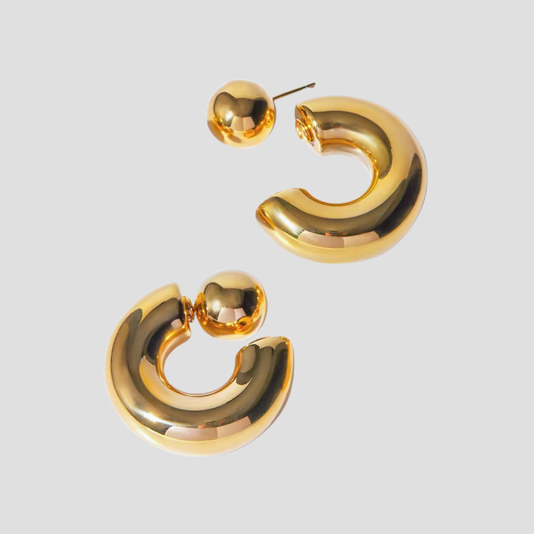 GRISÉ NYC 2-in-1 Bold Midi 18k Gold Earrings with detachable ball design and polished finish.