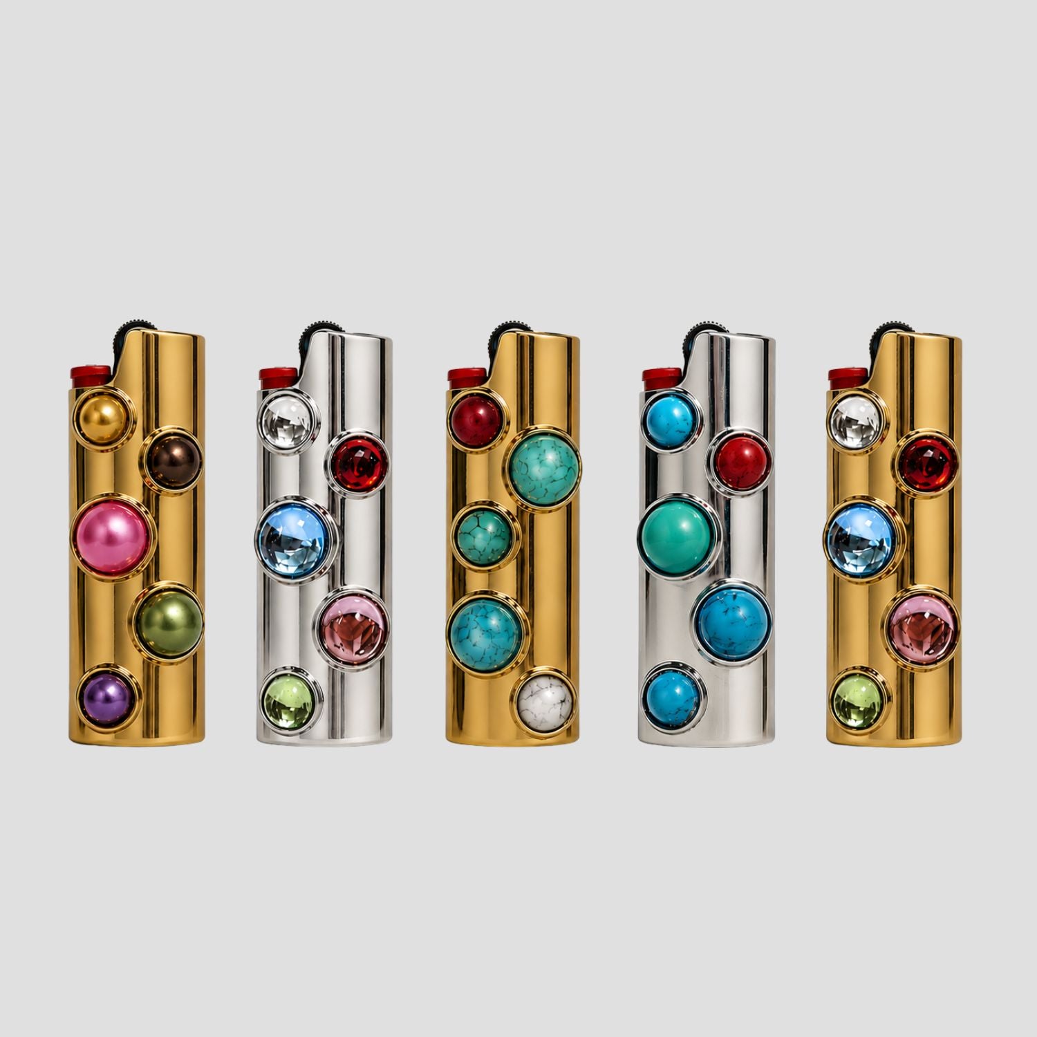 GRISÉ NYC Bedazzled Gemstone BIC J6 Maxi Lighter Cases featuring metallic gemstone, crystal pastel gemstone, and multi turquoise stone designs in gold and silver finishes.