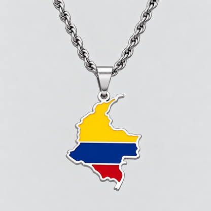 GRISÉ NYC silver Colombia flag map pendant necklace featuring yellow, blue, and red enamel detailing, paired with a 3mm silver rope chain on a light grey background.