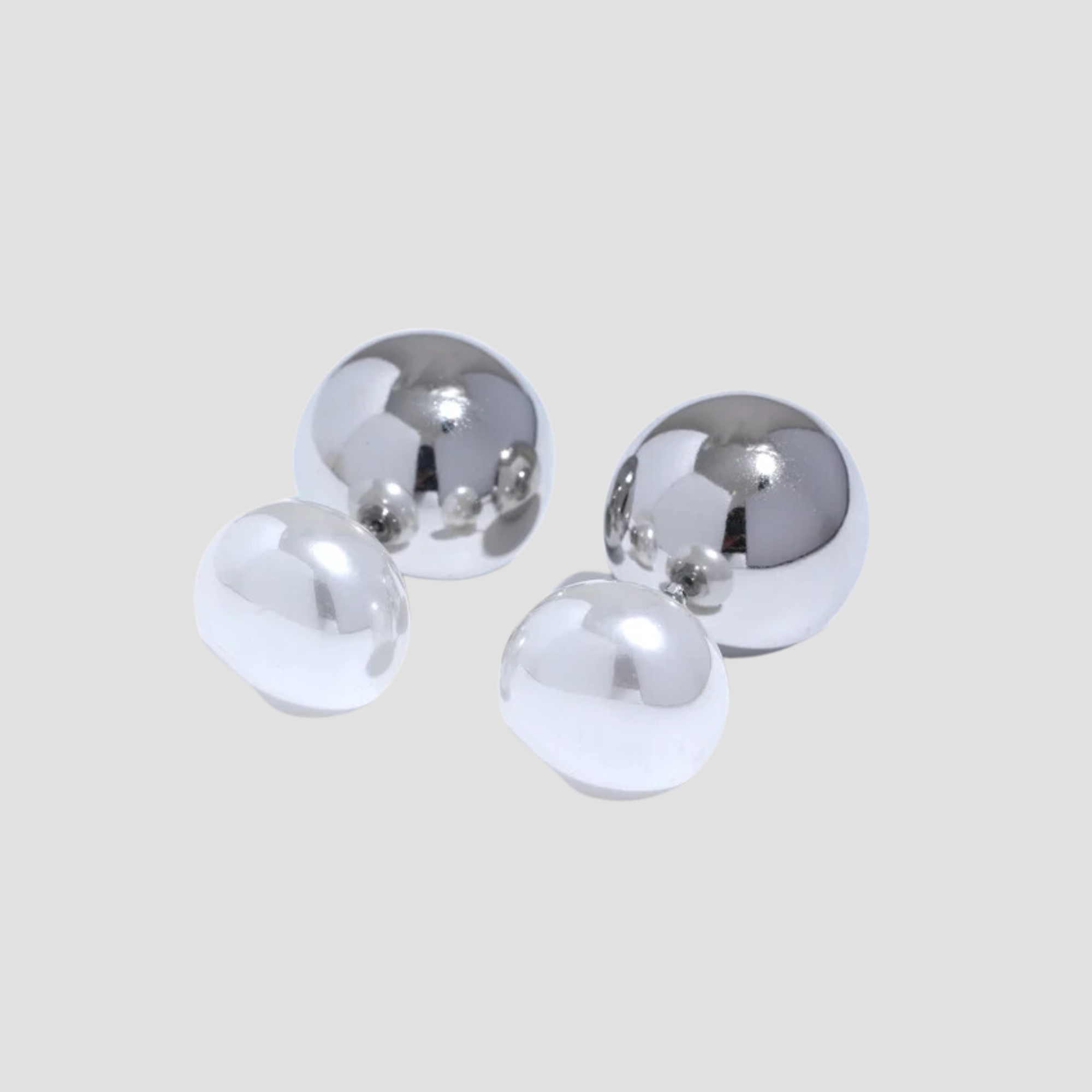 GRISÉ NYC 2 in 1 pearl stud earrings with stainless steel sphere.