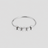 Dainty Bead Ring in polished stainless steel featuring five geometric bead accents on a minimalist silver band by GRISÉ NYC.