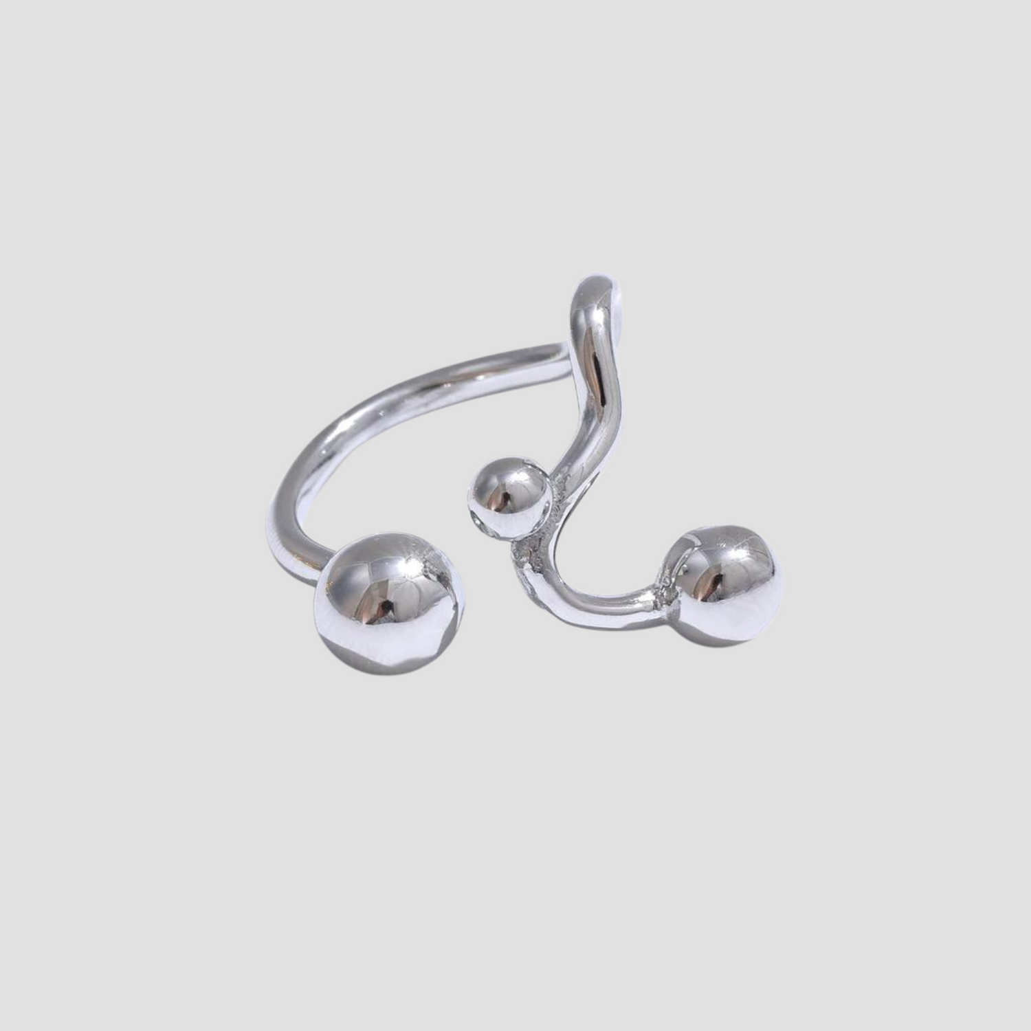 GRISÉ NYC Dots Stainless Steel Adjustable Ring featuring a polished silver open band with modern sphere accents and an adjustable minimalist design.