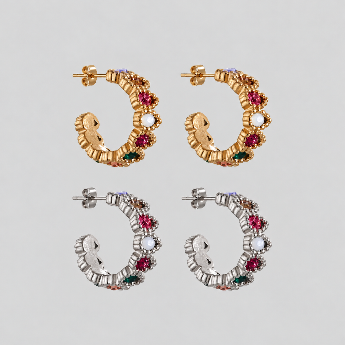 GRISÉ NYC Gemma Multicolor Hoop Earrings in gold and silver, featuring textured sculptural hoops adorned with vibrant multicolored cubic zirconia stones and butterfly back closures.