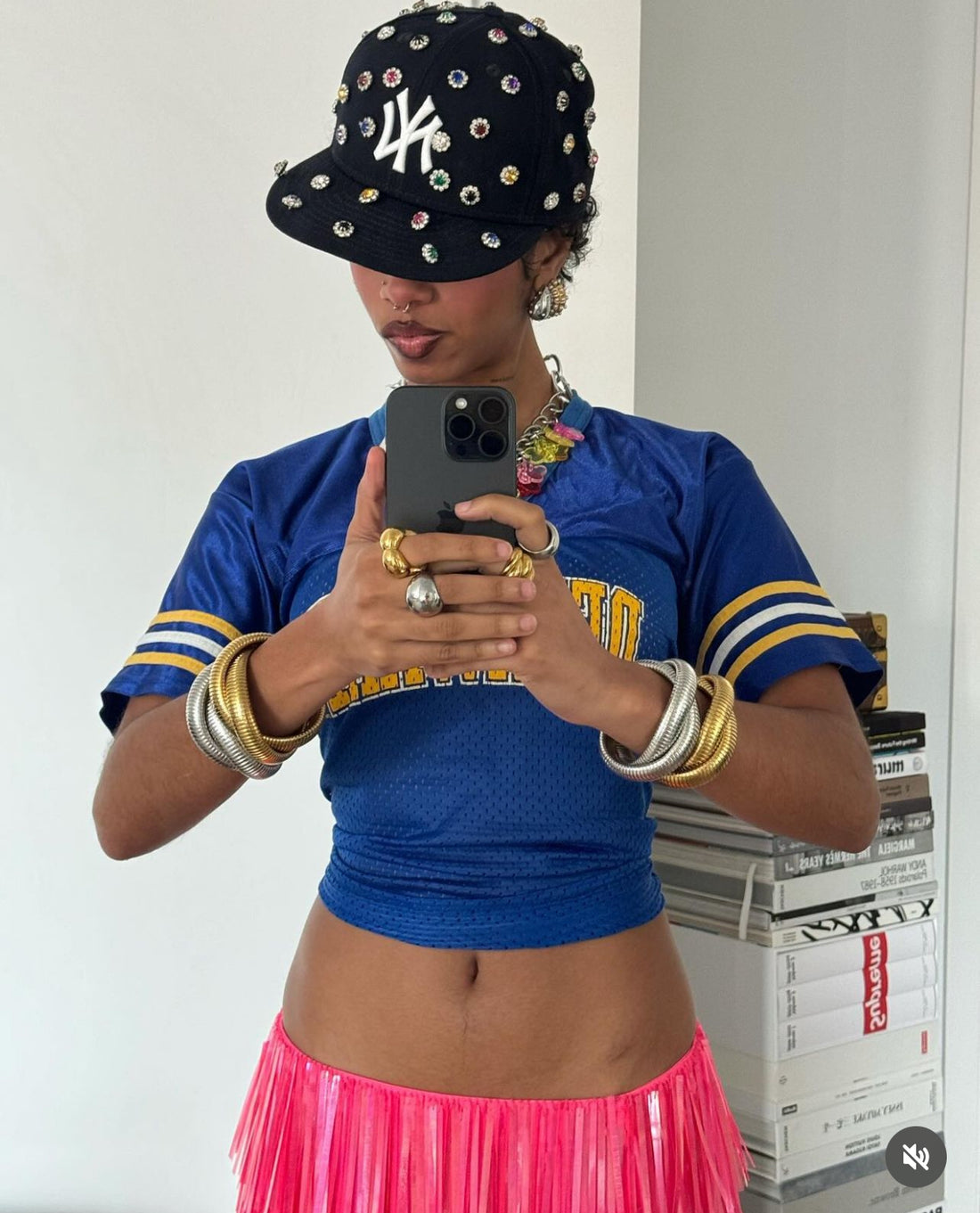 Geometric Bolt 18k Gold Ring styled on hand worn by fashion influencer Sierra Rena. Sierra Rena is wearing a modern sculptural design in 18k gold by GRISÉ NYC.