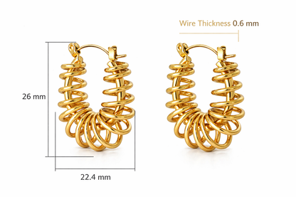 GRISÉ NYC gold barbed wire hoop earrings in 18k gold plated stainless steel with sculptural wire design