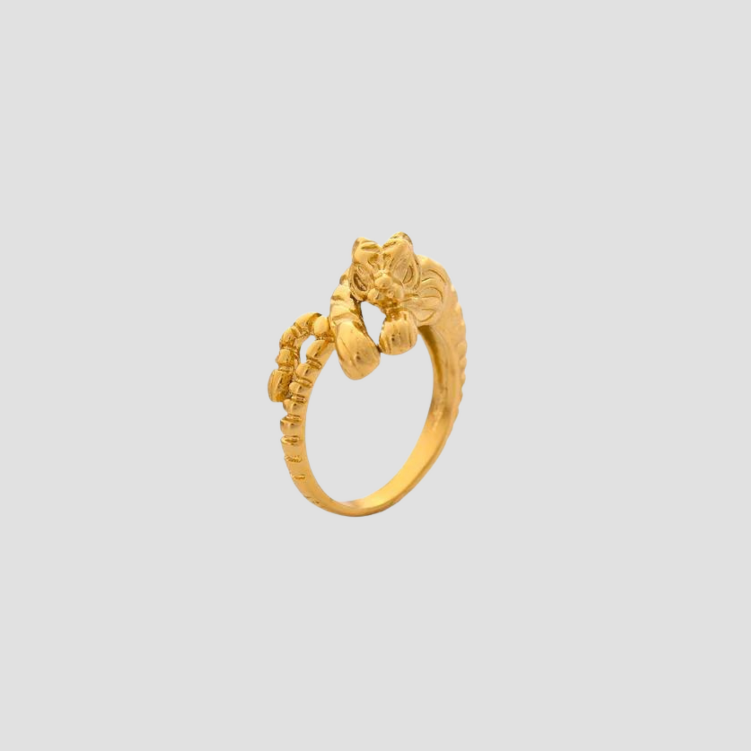 Unleash bold style with the GRISÉ Golden Tiger ring. 18k gold plated stainless steel statement ring that is tarnish free durable and unisex.