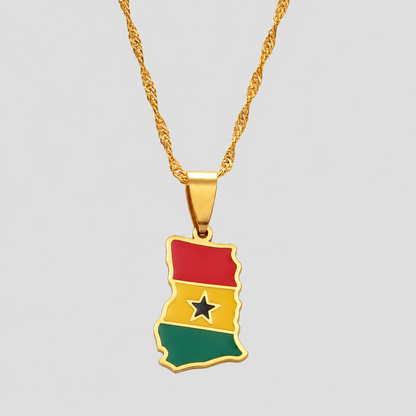 Gold Guyana flag map pendant necklace by GRISÉ NYC featuring a Guyanese flag design with red, yellow, green, black, and white enamel on a textured gold-tone chain.