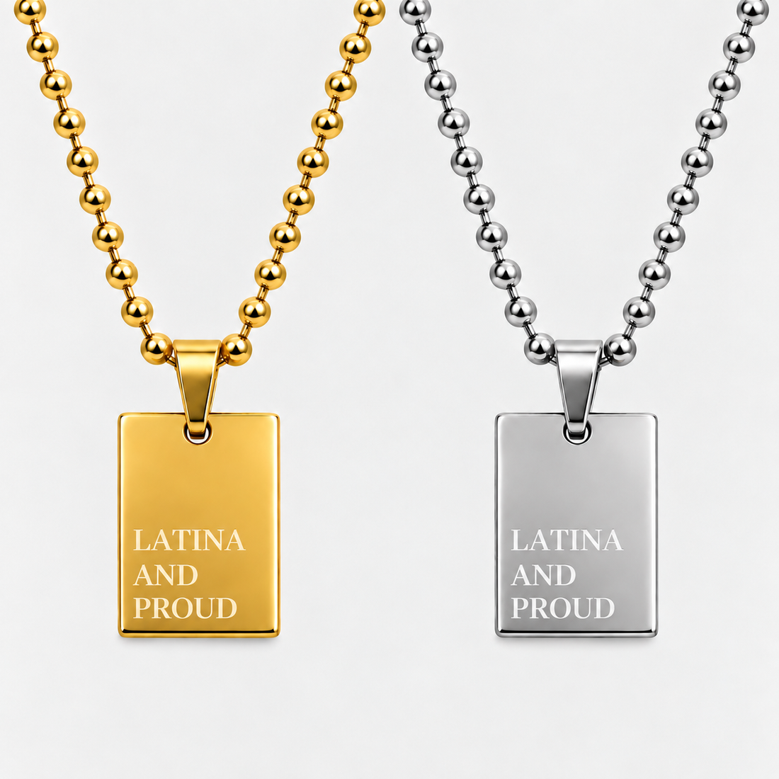 GRISÉ NYC LATINA AND PROUD pendant necklace in gold and silver.