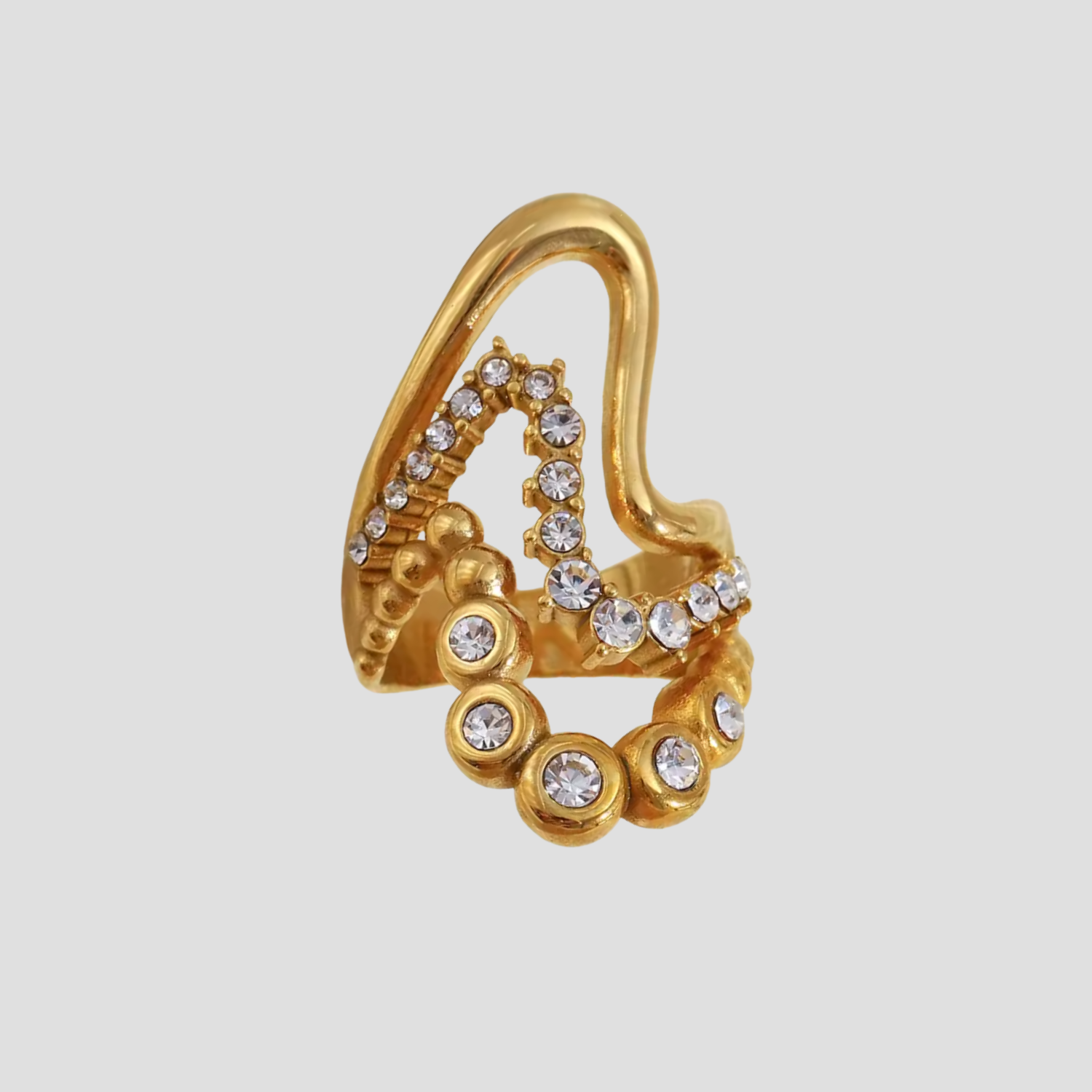 GRISÉ NYC Lustre Wave Ring with sculptural wave design and crystal detailing in polished 18k gold finish.