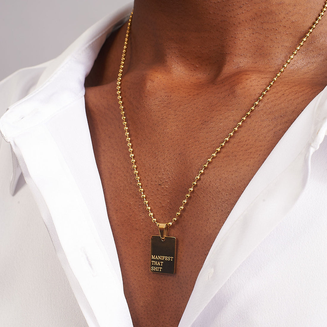 GRISÉ NYC manifest that necklace gold necklace on model