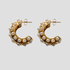 Mimi bold pearl hoop earrings in 18k gold plated stainless steel with simulated pearls by GRISÉ NYC.