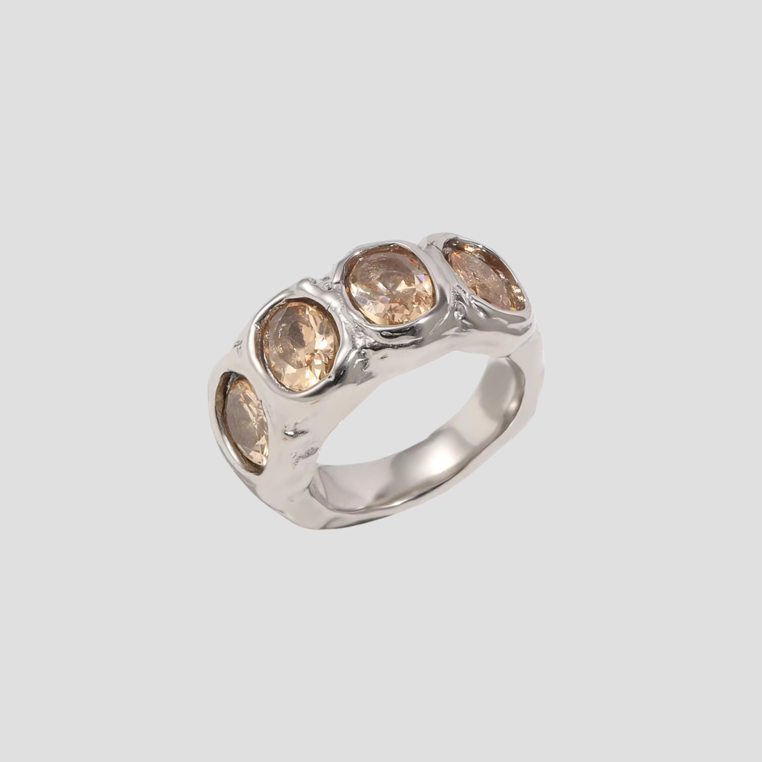 GRISÉ NYC Molten Crown Gems Ring in silver stainless steel with champagne gemstones on gray background