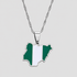 Silver Nigeria flag map pendant necklace by GRISÉ NYC featuring green and white enamel detailing, polished silver-tone edges, and a textured silver chain against a light gray background.